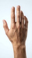 Male hand with natural skin texture showing palm and fingers against clean white background for design projects.