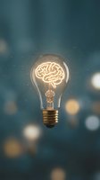 Glowing light bulb with brain filament symbolizing creativity, innovation and bright ideas against blurred bokeh background for business concepts.
