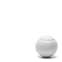 White tennis ball isolated on clean background for sports equipment designs and athletic marketing materials.