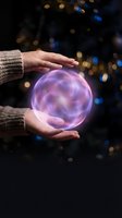 Hands holding glowing purple energy sphere with magical bokeh lights background for mystical and spiritual concepts.