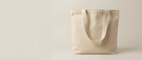 Empty natural linen tote bag isolated on white background, ready for branding, merchandise design, and retail packaging mockups.