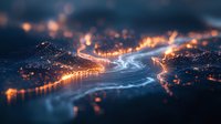 Aerial night view of winding river through illuminated city with glowing lights creating magical atmosphere, captured with tilt-shift effect for miniature appearance.