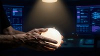Hands holding glowing sphere with digital data screens in background, representing technology innovation, artificial intelligence, and future digital solutions for business applications.