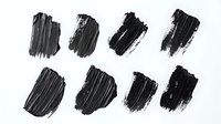 Black watercolor brush strokes collection on white background, artistic paint smears and splatters for creative design projects and digital art compositions.