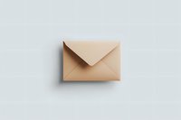 Beige paper envelope on white background with soft shadow, minimalist composition for business communication and correspondence design layouts.