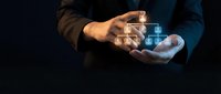 Businessman hands protecting glowing digital padlock icon representing cybersecurity, data protection and online privacy concepts for corporate security solutions.