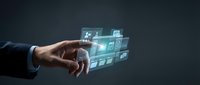 Business hand touching digital interface with glowing icons representing modern technology and connectivity solutions for corporate applications.