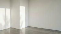 Empty modern room corner with white walls and gray tile flooring featuring natural window light shadows creating minimalist interior space for design mockups.