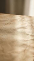 Natural wood grain texture surface with warm lighting and blurred background for interior design and furniture projects.