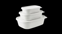 Set of three white plastic food storage containers with lids, stacked by size, isolated on transparent background, ready for stickers, clipart, and print on demand.