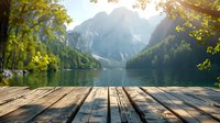 Scenic mountain lake landscape with wooden pier deck in foreground, perfect for travel advertising, outdoor recreation promotion or nature-themed designs. Sunlit alpine scenery reflects in calm waters