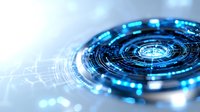 Futuristic circular technology interface with glowing blue lights and digital elements creating dynamic motion effect against blurred background.