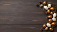 Speckled and metallic copper Easter eggs arranged with small quail eggs in nest on dark wooden background, creating festive spring composition with copy space.