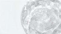 Transparent gel or serum swirl with bubbles and texture, isolated on white background for skincare, cosmetics, and beauty product design use.