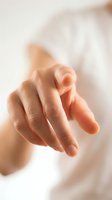 Newborn baby hand gently grasping, close-up shot showing tiny fingers and delicate skin texture. Perfect for parenting, healthcare, and family-related designs.