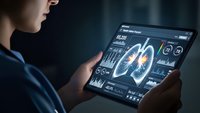 Medical professional analyzing lung scan data on digital tablet with healthcare analytics dashboard interface for diagnostic purposes.