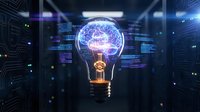 Glowing light bulb with brain inside surrounded by digital circuit patterns and data streams representing artificial intelligence and innovation concepts.