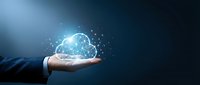 Businessman hand holding glowing digital brain with network connections representing artificial intelligence and machine learning technology concepts.