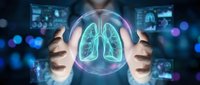 Hands holding glowing lungs hologram with digital medical interface, representing respiratory health, pulmonary care, and advanced healthcare technology for medical presentations.