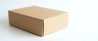 Brown cardboard shipping box isolated on white background for packaging and delivery services.