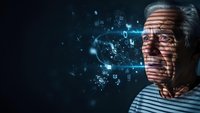 Senior man with digital projection on face exploring artificial intelligence and data visualization technology in futuristic cyber environment.