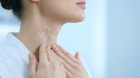 Young woman touching neck with transparent anatomical thyroid gland overlay showing healthcare and medical wellness concept for endocrine system education.
