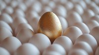 Golden egg standing out among white eggs in rows, symbolizing uniqueness, success and exceptional value in business concept. Leadership metaphor.