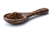 Ground cocoa powder in wooden spoon with natural grain pattern on white background, isolated food photography for culinary and cooking designs.