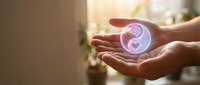 Hands holding glowing orb with brain and heart symbols representing balance between intellect and emotion, mental health awareness, emotional intelligence, and holistic wellness concept.
