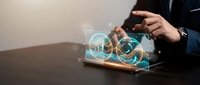 Businessman using tablet with digital cloud storage icons and data transfer visualization for modern technology and connectivity solutions.