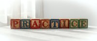 Wooden alphabet blocks spelling PRACTICE on white surface for educational learning and skill development concepts.