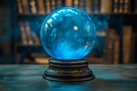 Glowing blue crystal ball on ornate base against dark library background, mystical fortune telling sphere emits ethereal light in mysterious atmosphere.