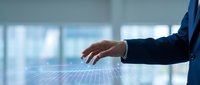 Businessman hand touching holographic digital grid interface in modern office environment for technology and innovation concepts.