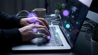Professional programmer typing on laptop with glowing digital interface elements and futuristic holographic display in modern workspace environment.