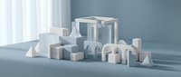 Assorted white geometric shapes and architectural forms arranged on neutral surface for design and branding projects.
