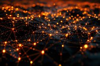 Abstract network of glowing orange light points connected by lines against dark background, creating futuristic technology visualization pattern.