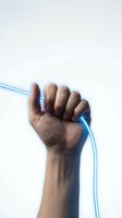 Raised fist with blue energy streams symbolizing power, strength, and determination for protest, activism, and empowerment concepts.