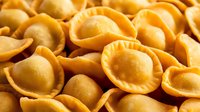 Golden fried wontons with crispy exterior and savory filling, perfect for Asian cuisine, restaurant menus, food photography, and culinary content.