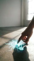 Hand touching glowing light bulb hologram on floor in bright room, representing innovation, technology, and creative ideas for business and digital transformation concepts.