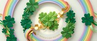 Colorful rainbow arcs with green shamrock clovers and gold coins creating festive St. Patrick's Day celebration decoration on white background.