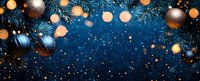 Festive blue Christmas background with fir branches, golden bokeh lights, and elegant ornaments for holiday greeting cards and designs.