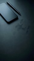 Smartphone and pen arranged on dark textured surface, minimalist workspace setup for business, technology, and professional communication concepts.