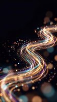 Abstract flowing light trails with golden and blue streaks creating dynamic energy waves on dark background with glowing particles and bokeh effects.