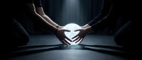 Hands holding glowing sphere in dark space, symbolizing energy, innovation, and power for technology, business, and creative concepts.