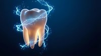 Glowing tooth with sparkling energy swirls on dark blue background for dental care and oral health concepts in medical presentations and healthcare marketing.