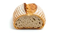 Fresh baked artisan sourdough bread loaf cut in half showing airy texture and golden crust on white background isolated for bakery design use.
