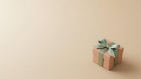 Wrapped gift box with sage green bow on neutral beige background, isolated for holiday, celebration, and design projects.