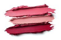 Smeared lipstick or cream blush texture swatches in pink and red shades on white background, cosmetic product sample strokes isolated for beauty and makeup design.
