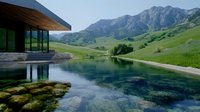 Tranquil mountain lake reflects rugged peaks and modern architecture, with crystal clear water revealing mossy stones beneath surface in serene natural setting.