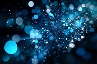 Abstract blue bokeh lights with sparkling particles and glowing orbs creating magical atmosphere for digital backgrounds and creative projects.